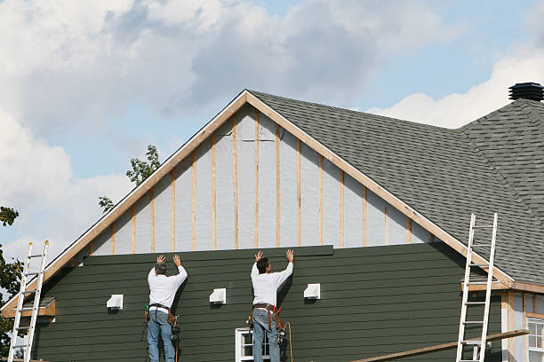 Professional Siding technician working in Spangler, PA